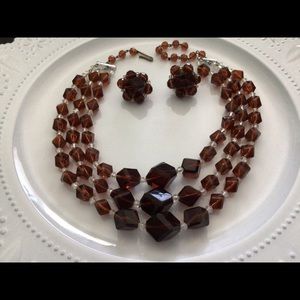 Vintage double necklace and clip earrings.